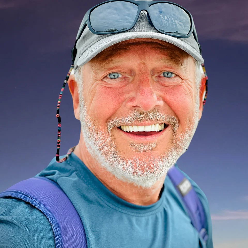 Skip Grant smiling in outdoor gear